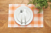 Hazel Plaid woven placemat styled with serve ware and greenery.