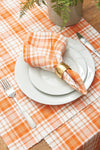 Hazel Plaid woven tabletop collection styled with serve ware and fern centerpiece.