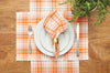 Hazel Plaid woven tabletop collection styled with serve ware and fern centerpiece.