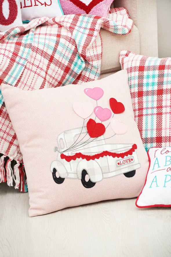 Hearts Truck Valentines Day pillow styled with a plaid throw and pillow.