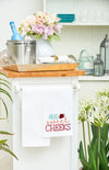 Hello sweet cheeks white towel hanging in a kitchen