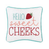 mini white pillow that says hello in light blue, sweet in peach and cheeks in red embroidered with light blue piping around the edges with a strawberry by the word hello