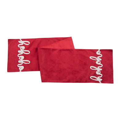 red embroidered table runner with the words ho ho ho on each end in white