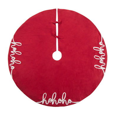 red tree skirt with the words hohoho in write written on three edges in a flourishing script