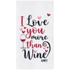 flour sack kitchen towel with an embroidered phrase of I love you more than wine surrounded by little hearts