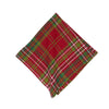 woven napkin with a red background and white and green accents in the plaid design