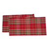 woven runner with a red background and white and green accents in the plaid design