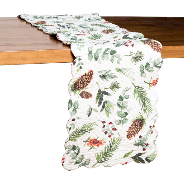 watercolor inspired foliage and pinecones on quilted table runner