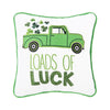 white pillow with green border picturing a green truck with shamrocks coming out of the back with the words "loads of luck" in green