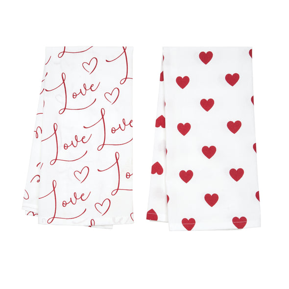 printed valentine's day towel set with different designs. one towel has love repeated in flourishing text while the second has an all over heart pattern