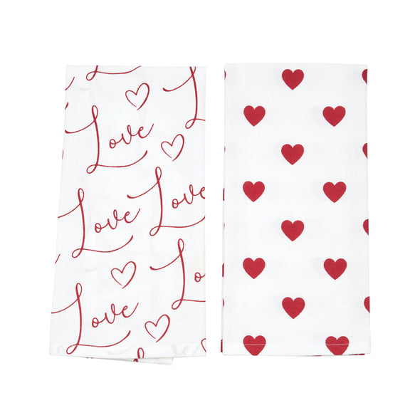 printed valentine's day towel set with different designs. one towel has love repeated in flourishing text while the second has an all over heart pattern