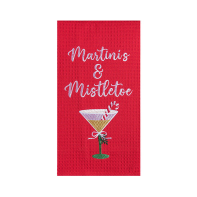 red waffle weave kitchen towel with the phrase martinis and mistletoe above a holiday cocktail with a candy candy