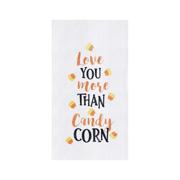 flour sack towel with embroidered love you more than candy corn phrase surrounded by candy corn pieces