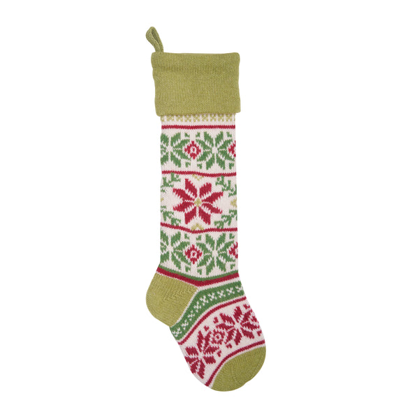 knit stocking with a red snowflake and a green white and red holiday pattern