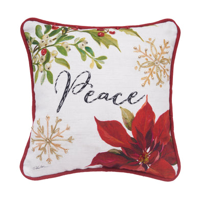 embellished and printed pillow with artwork by Silvia Vassileva of poinsettias decorating the corners and the word Peace written in the center