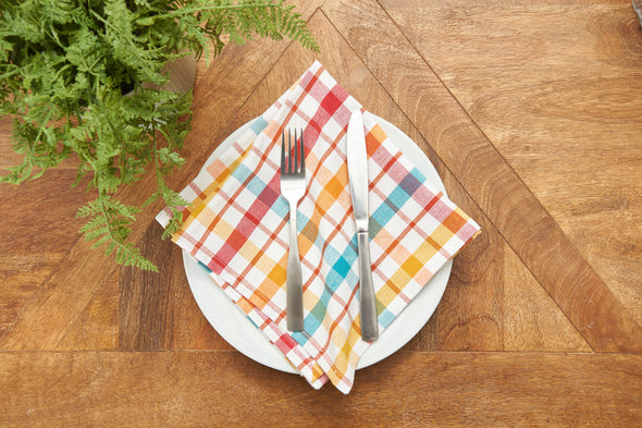 Radley Plaid woven napkin styled with serve ware and greenery