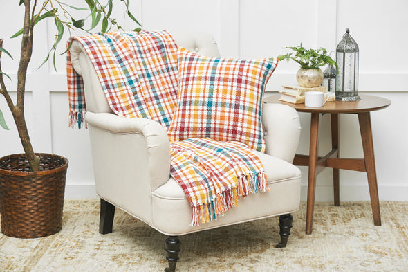 Radley Plaid Throw styled with the Radley Plaid Pillow in an everyday living room setting.