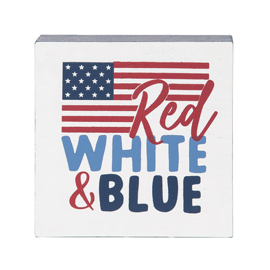 shelf block with the words red white & blue in front of an American flag