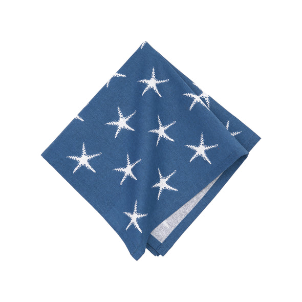 printed napkin with a blue background and white starfish