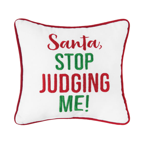 Stop Judging Me Pillow with the words " Santa, stop judging me!" in red and green on a white pillow with red trim