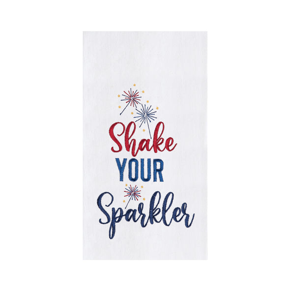 flour sack towel with the words shake your sparkler in flourishing text surrounded by sparklers in red and blue with sparks of yellow