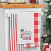 waffle weave towel with a snowman wearing a top hat and scarf next to the phrase there's snow place like home hanging from a kitchen counter