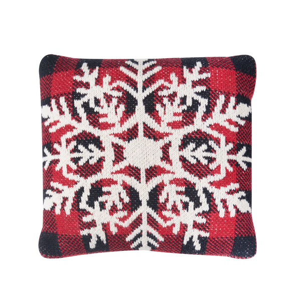 red and black buffalo check knitted pillow with a large white snowflake overlaying the plaid design