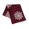 knitted throw with a red and black buffalo check and white snowflakes