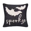 black knitted pillow with the word spooky and two flying bats