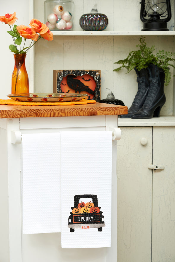 Spooky Pumpkin Truck kitchen towel styled in a Halloween themed kitchen