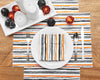 Spooky Stripe table linens styled with serve ware and Halloween centerpiece.