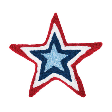 a hooked pillow shaped like a star with a red border and white dark blue and light blue stars that form smaller stars