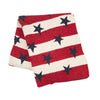 knitted throw with red and white stripes and navy blue stars