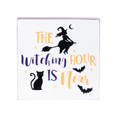 white shelf block with Halloween icons including a witch flying on a broom, black cat, and bats