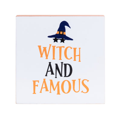 shelf block with the phrase Witch and Famous topped with a witches' hat and stars