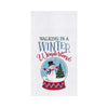 embroidered flour sack towel with the phrase Walking in a Winter Wonderland above a snow globe featuring a snowman in a winter scene next to a tree