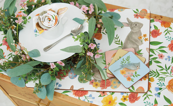 MDF floral bunny coasters with cork backing featuring bunnies on pastel colors with matching table linens