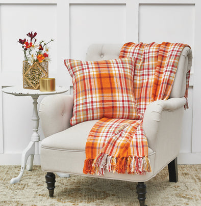 briar plaid throw and matching pillow styled on a chair