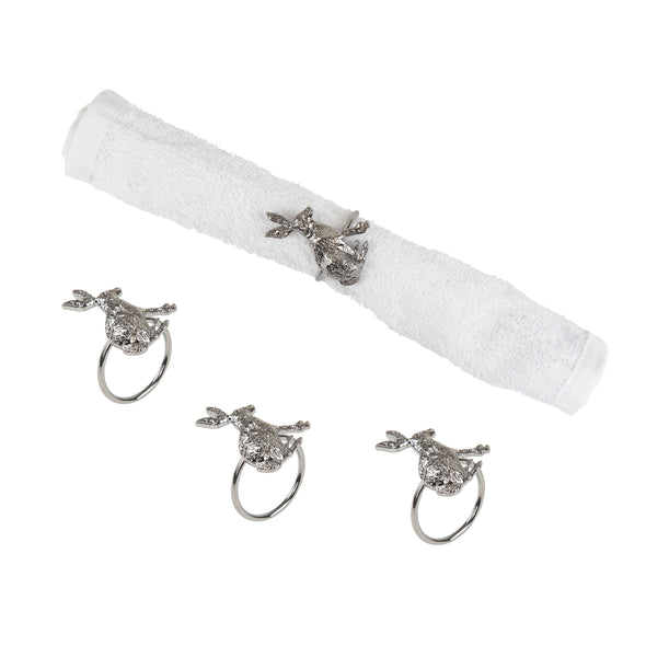 charcoal rabbit napkin ring set. one in use on a white napkin