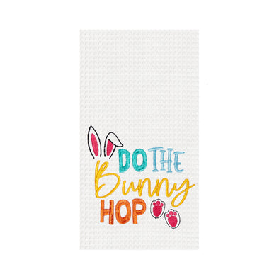 do the bunny hop embroidered on a white waffle weave kitchen towel