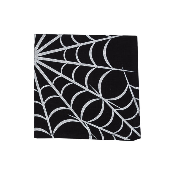 silver spider web printed on a black halloween napkin